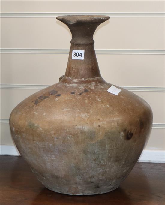 A large 19th century redware kendi height 40cm